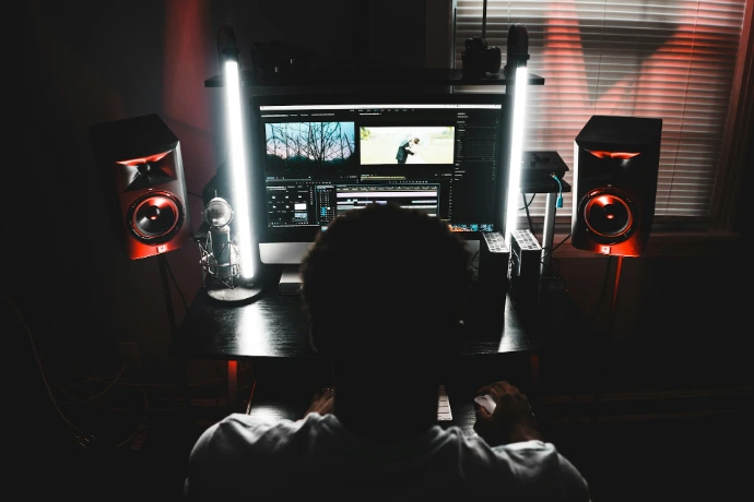 man using computer inside room